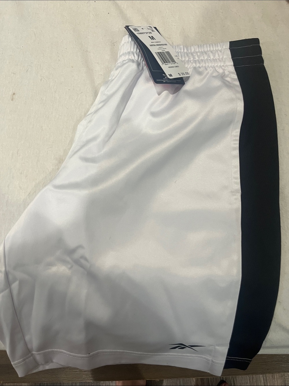 Reebok Men’s White Athletic Shorts with Black Side Stripe